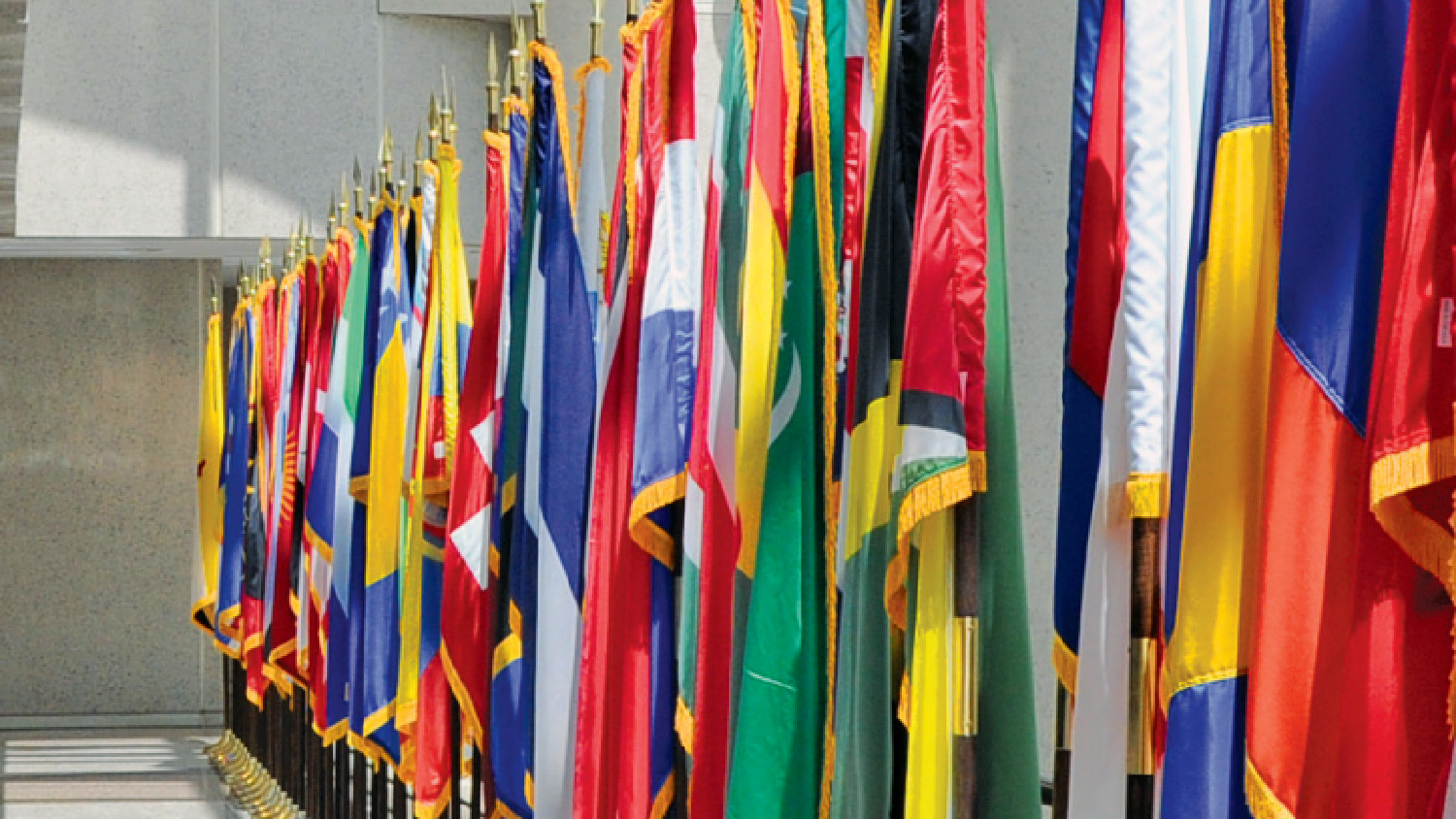Picture of approximately 30 flags from different countries around the world